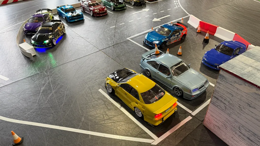 RC drift cars parked on a purpose-built track